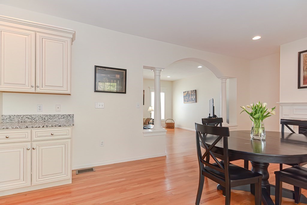 82 Swift Road Framingham, MA 01702 - Photo 6 of 39 a view of a dining room with furniture and wooden floor