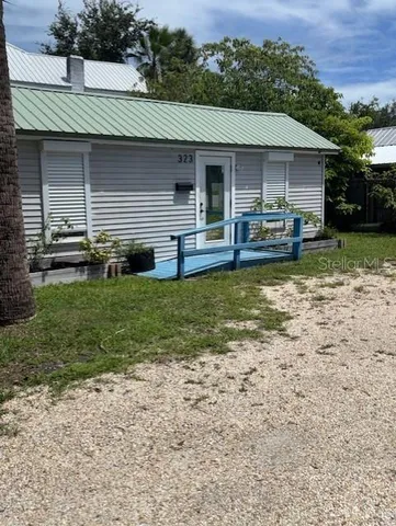 a front view of house with yard