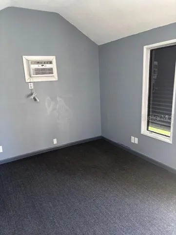 a view of a room with a window