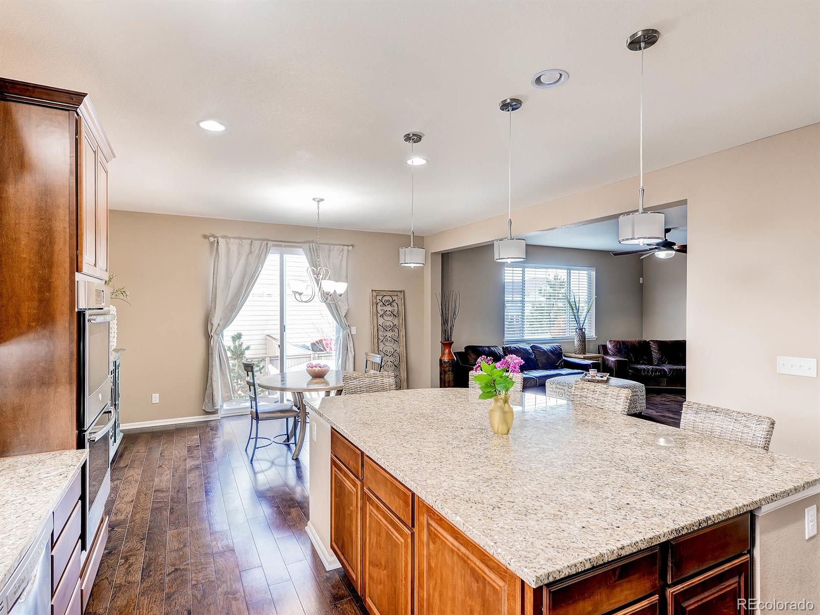 714 Springvale Road Castle Rock, CO 80104 - Photo 13 of 28 a view of a kitchen and dining room