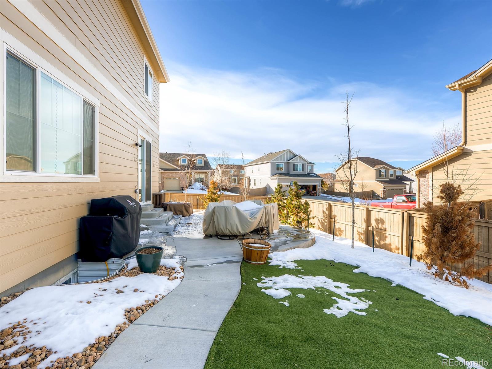 714 Springvale Road Castle Rock, CO 80104 - Photo 26 of 28 a front view of a house with garden