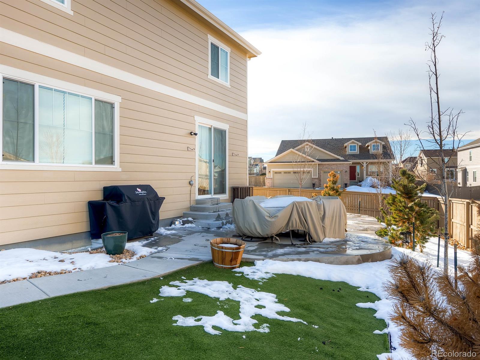 714 Springvale Road Castle Rock, CO 80104 - Photo 27 of 28 a view of a backyard with table and chairs