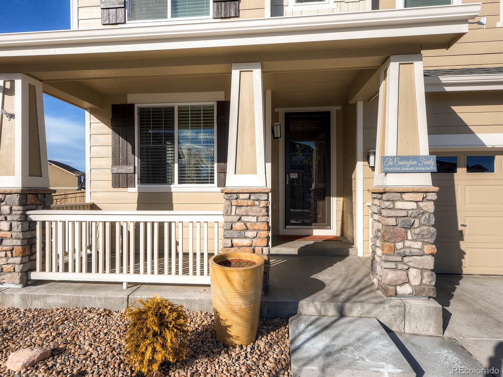 714 Springvale Road Castle Rock, CO 80104 - Photo 3 of 28 front view of a house with a bench