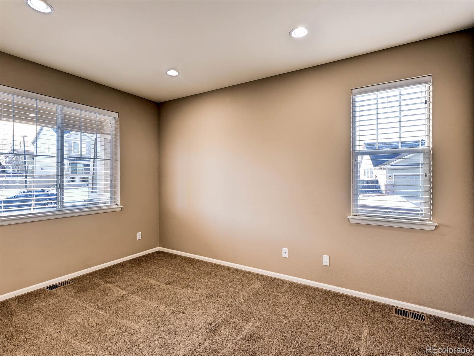 714 Springvale Road Castle Rock, CO 80104 - Photo 8 of 28 an empty room with a window