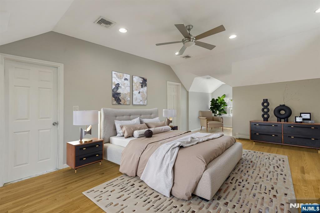 24 Sunderland Avenue Rutherford, NJ 07070 - Photo 19 of 40 a bedroom with a bed and a couch