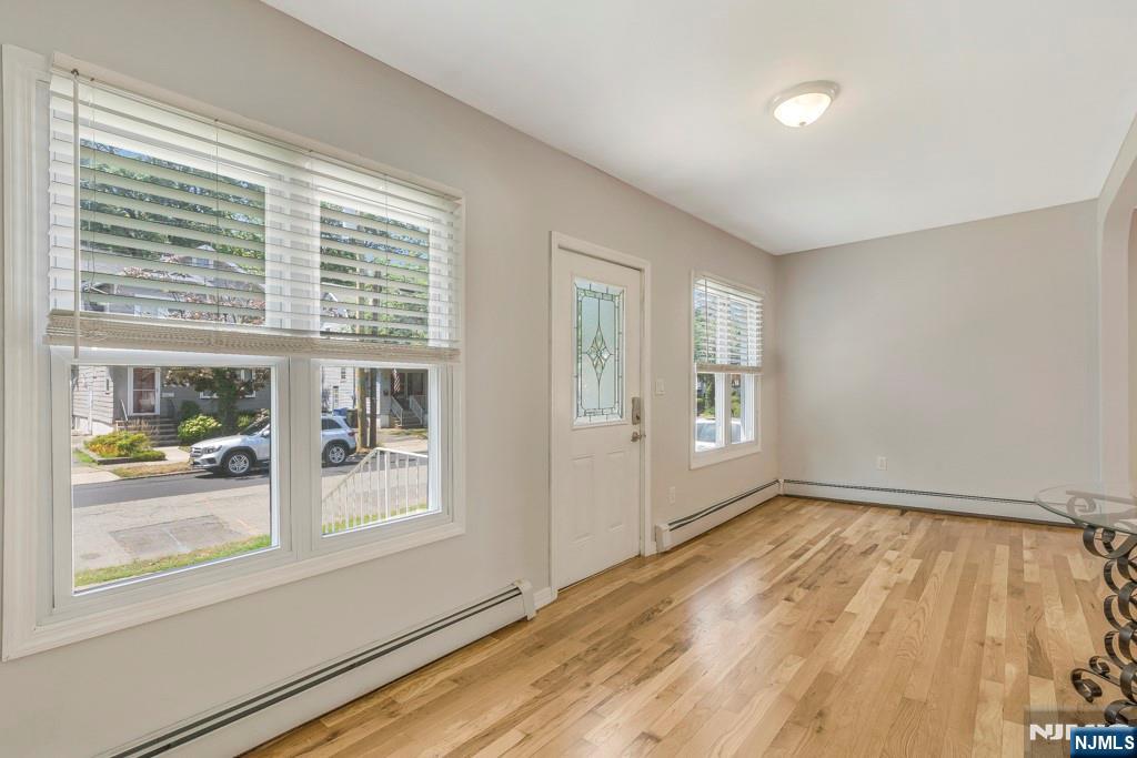 24 Sunderland Avenue Rutherford, NJ 07070 - Photo 3 of 40 a view of an empty room with a window