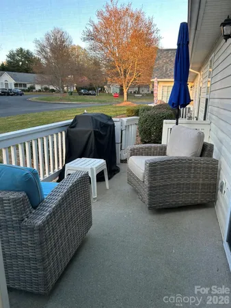a balcony with furniture