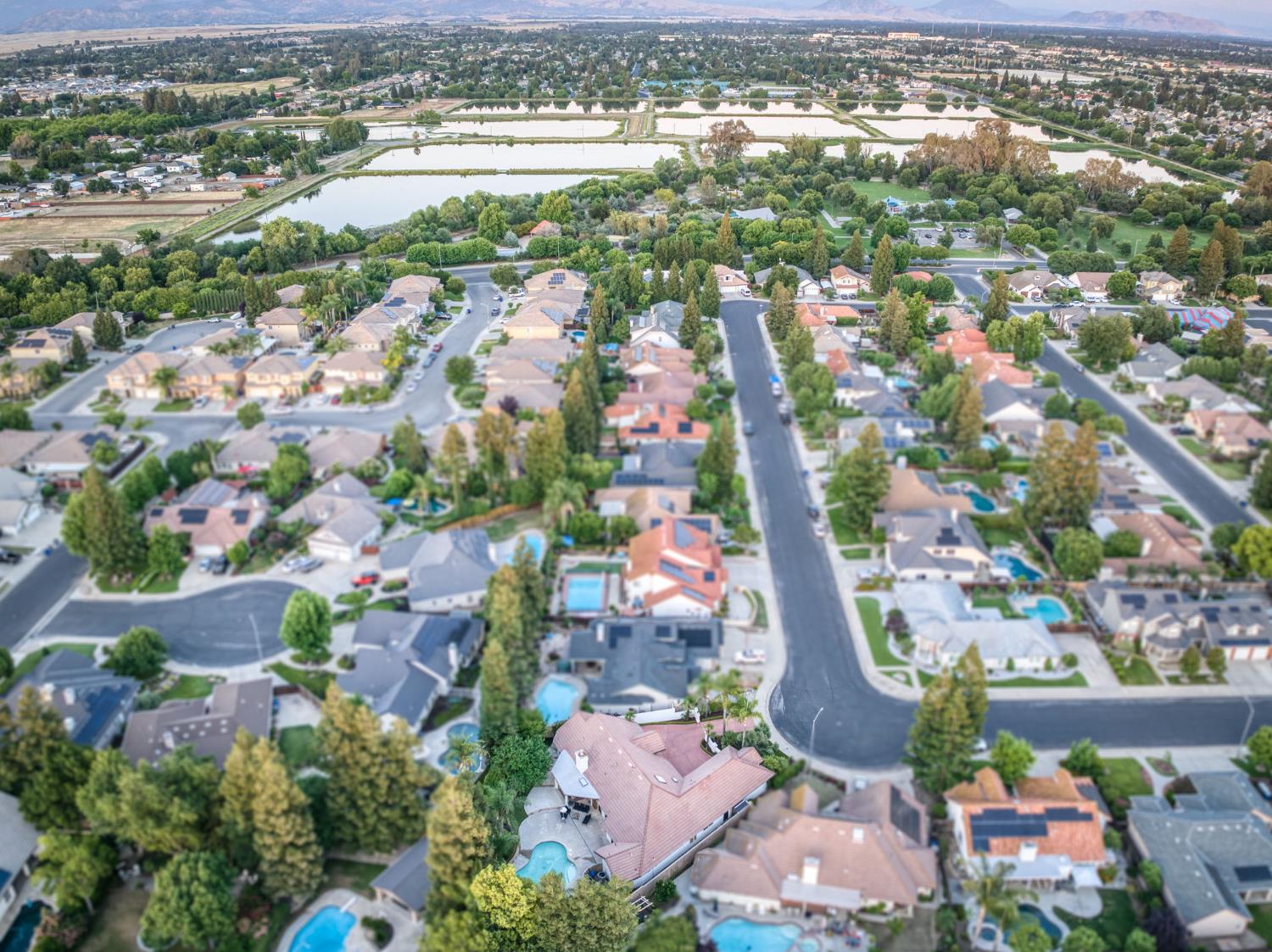 601 Decatur Avenue Clovis, CA 93611 - Photo 61 of 62 an aerial view of residential houses with outdoor space and trees