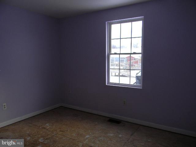 3922 North Point Road Baltimore, MD 21222 - Photo 15 of 22 an empty room with a window