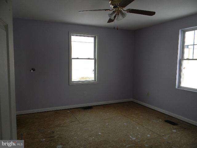 3922 North Point Road Baltimore, MD 21222 - Photo 16 of 22 an empty room with a window