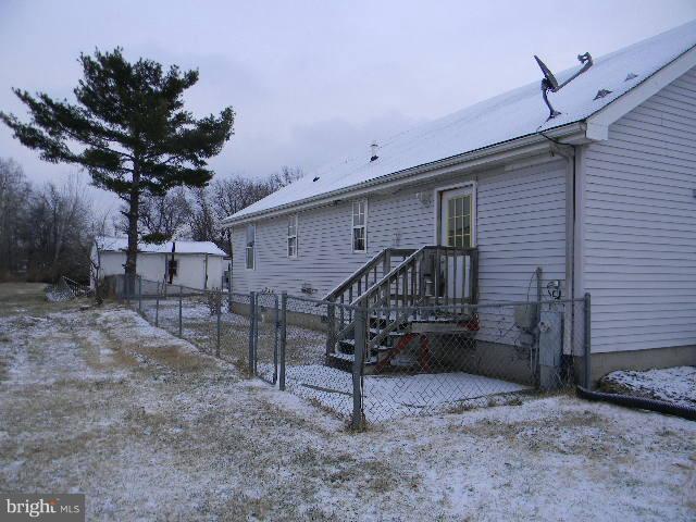 3922 North Point Road Baltimore, MD 21222 - Photo 19 of 22 a view of a house with a backyard