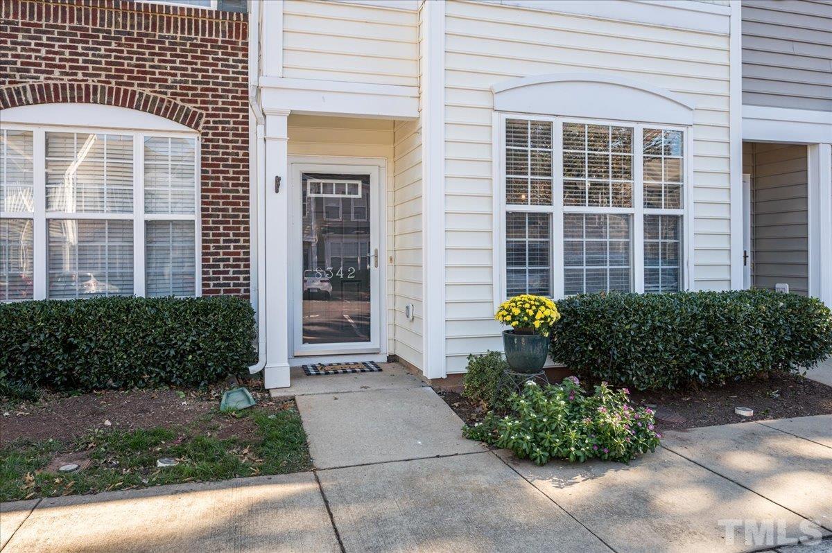 8342 City Loft Court Raleigh, NC 27613 - Photo 3 of 23 a front view of a house