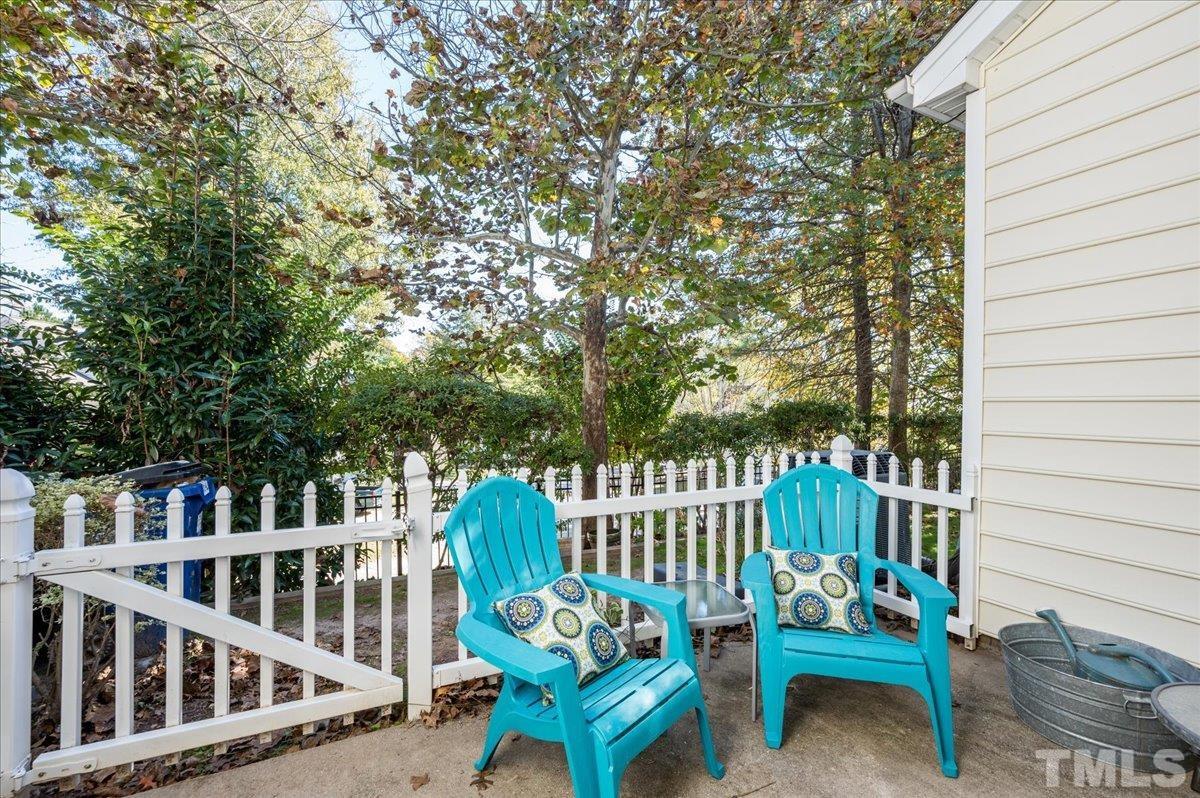 8342 City Loft Court Raleigh, NC 27613 - Photo 22 of 23 a view of a chair in wooden deck