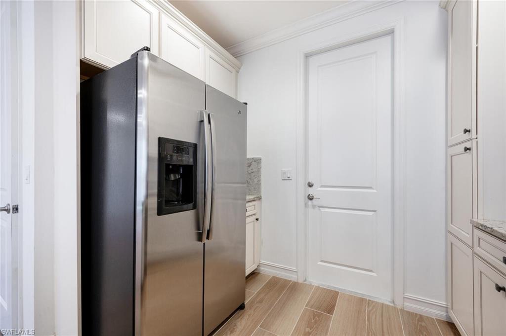 7761 Bristol Circle Naples, FL 34120 - Photo 10 of 32 a view of a hallway