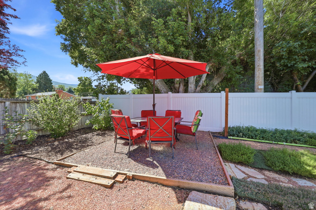 1180 North 400 East Bountiful, UT 84010 - Photo 38 of 50 Outdoor living area featuring a gravel patio defined by timber borders