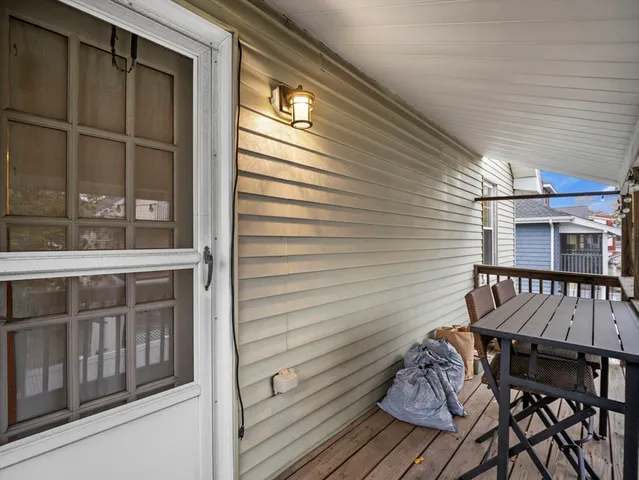 a view of a patio on wooden deck
