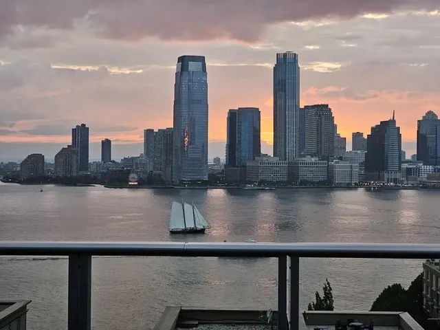 a view of outdoor space with a lake view