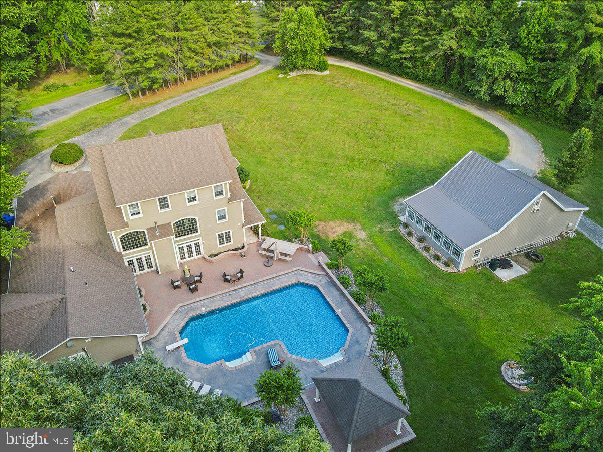 102 Little Neck Road Stevensville, MD 21666 - Photo 74 of 77 an aerial view of a house with outdoor space swimming pool and outdoor space