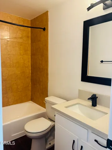 a bathroom with a sink and a toilet