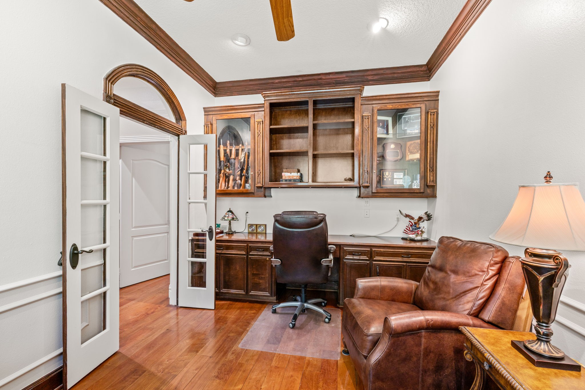 3018 McDonald Lane Spring, TX 77380 - Photo 17 of 48 a work room with furniture and wooden floor