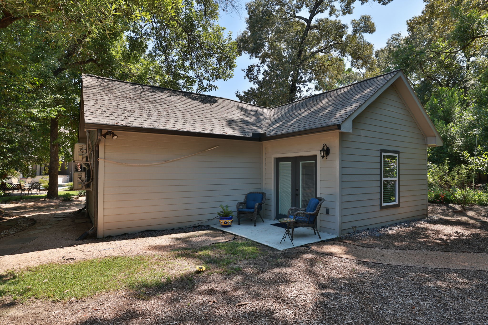 3018 McDonald Lane Spring, TX 77380 - Photo 32 of 48 a view of a house with a yard and garage