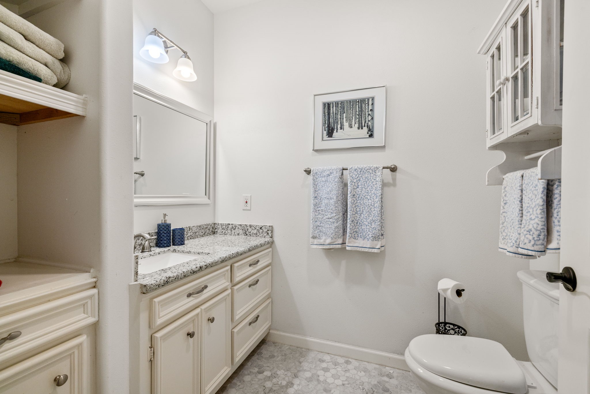 3018 McDonald Lane Spring, TX 77380 - Photo 36 of 48 a bathroom with a granite countertop sink and a mirror