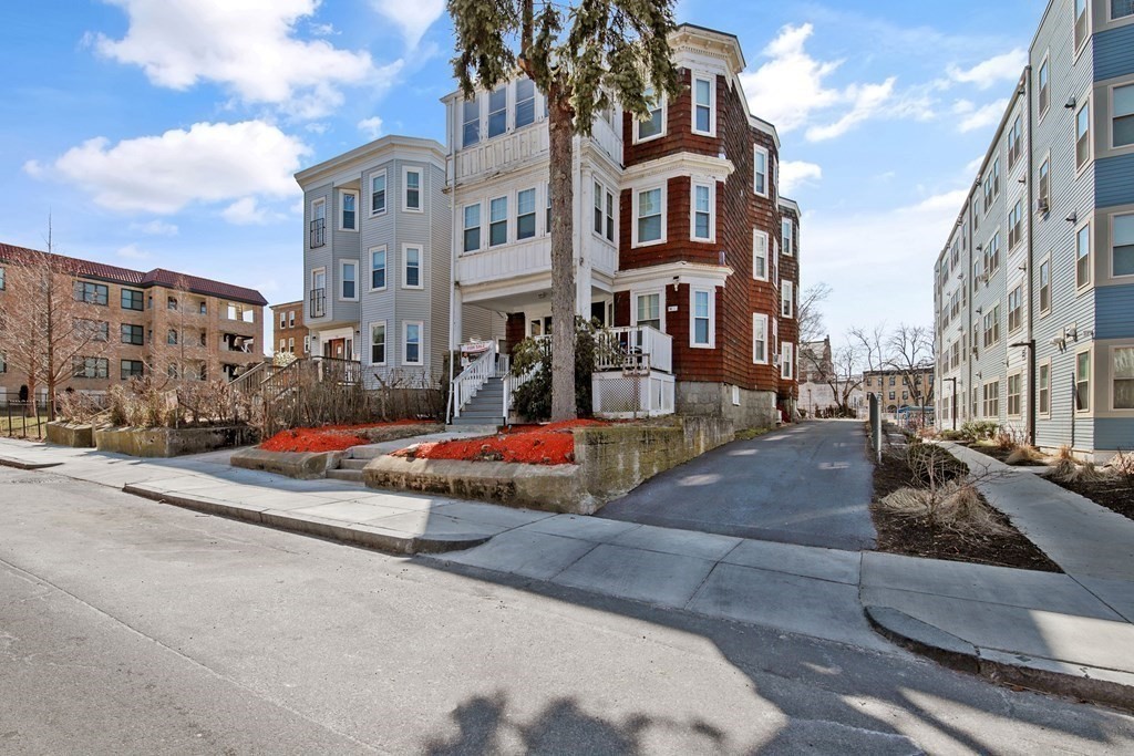 a view of a street with buildings