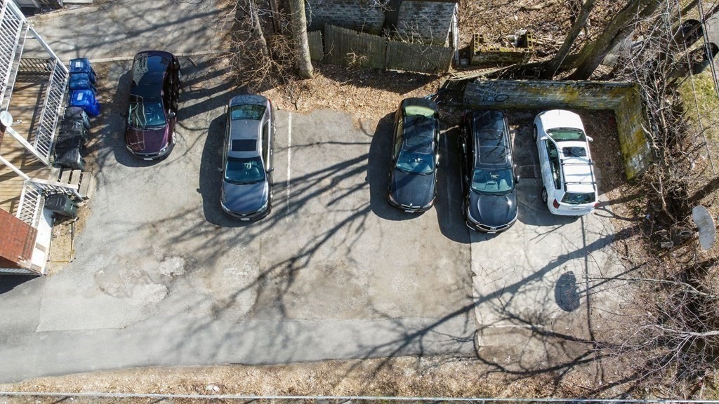 71 Walnut Park Boston, MA 02119 - Photo 18 of 36 a view of a two room with wooden walls