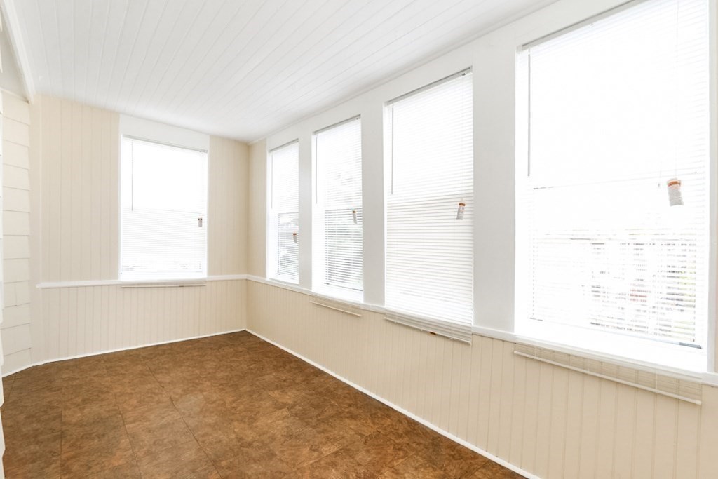 71 Walnut Park Boston, MA 02119 - Photo 23 of 36 a view of an empty room with a window