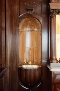a bathroom with a light fixture and a glass door