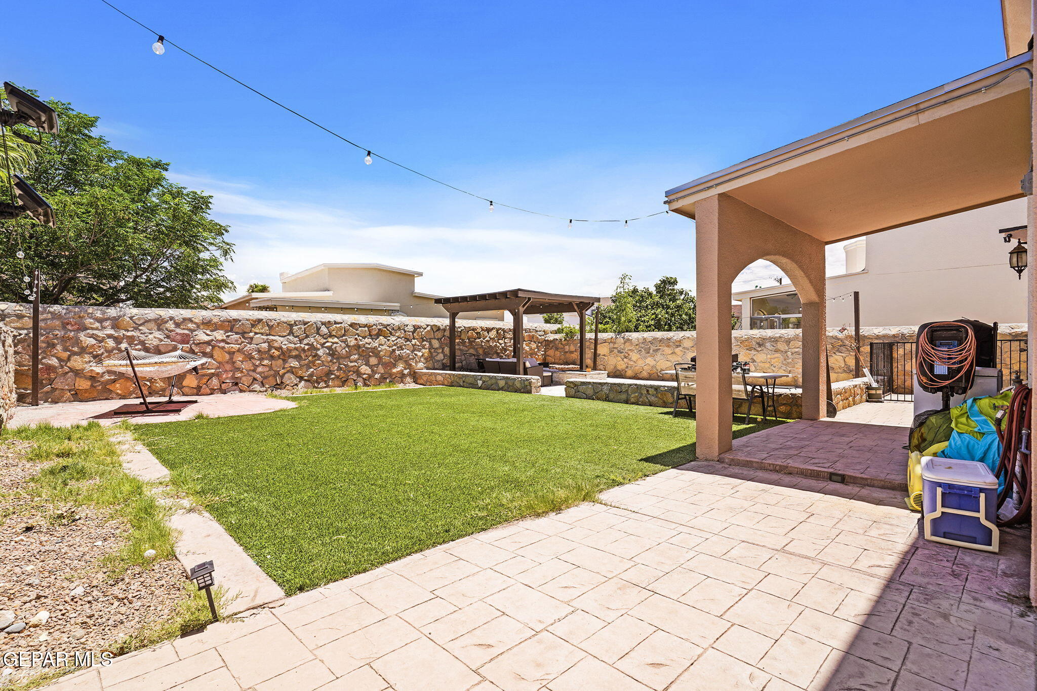 3152 Rustic Hidden Drive El Paso, TX 79938 - Photo 30 of 38 a front view of a house with garden
