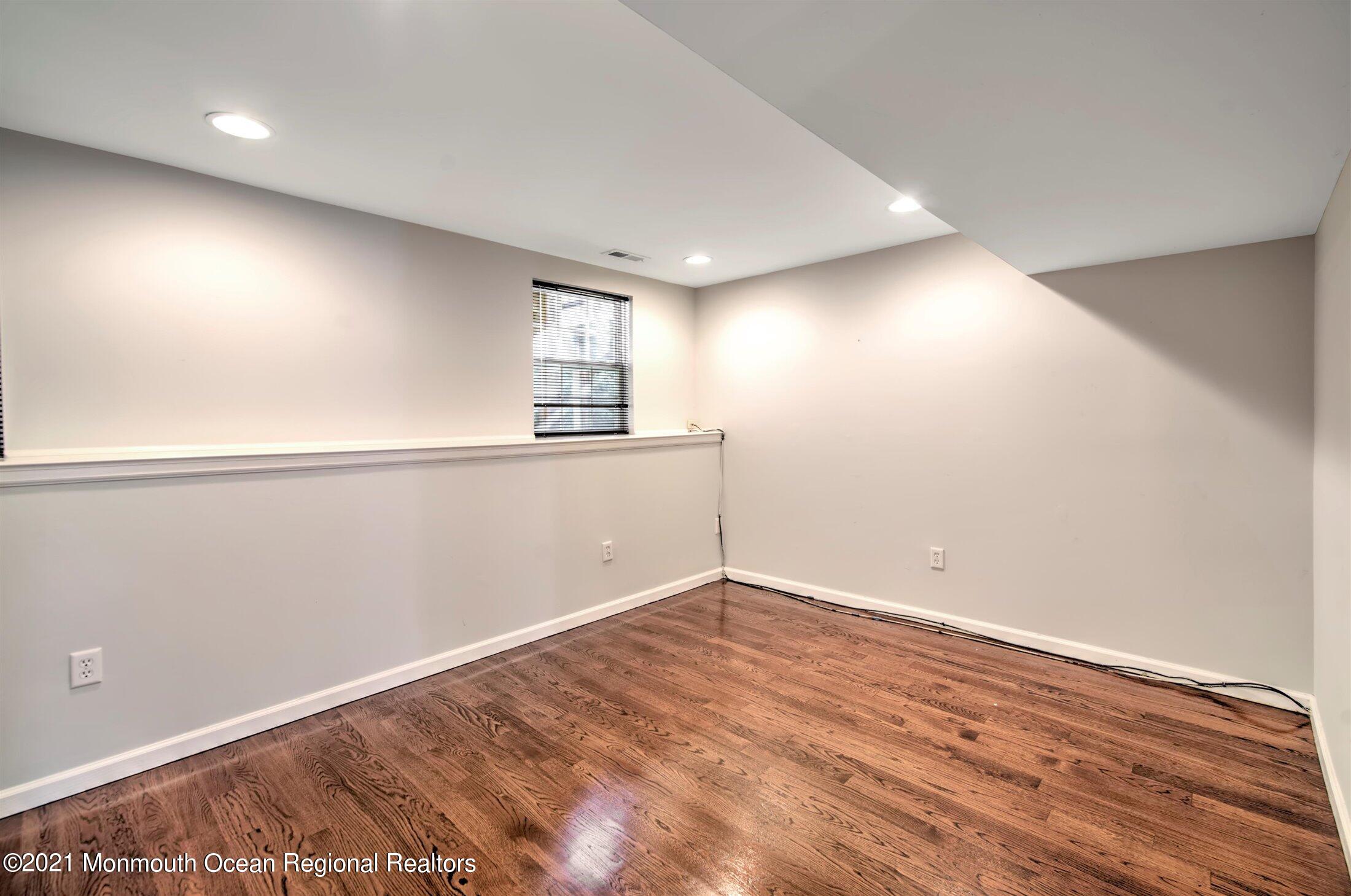 61 Saxton Road Farmingdale, NJ 07727 - Photo 5 of 37 05-LOWER LEVEL DEN