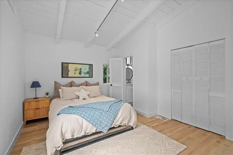 a view of a glass door and a balcony