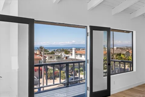 a room with furniture and wooden floor