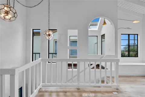 a view of a white building with a large windows