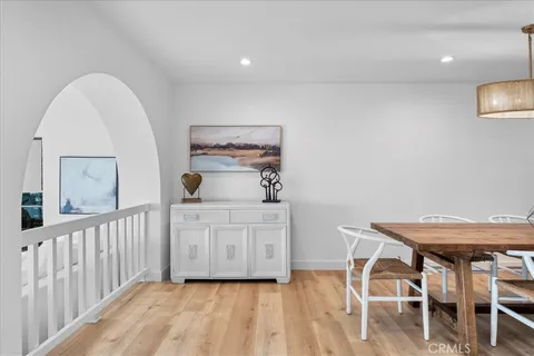 a view of a balcony and potted plants