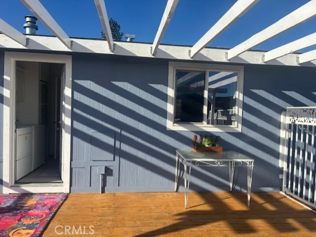 a kitchen with a sink and large window