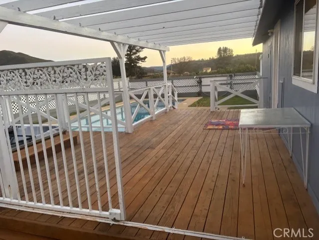 a kitchen with a sink and a mirror