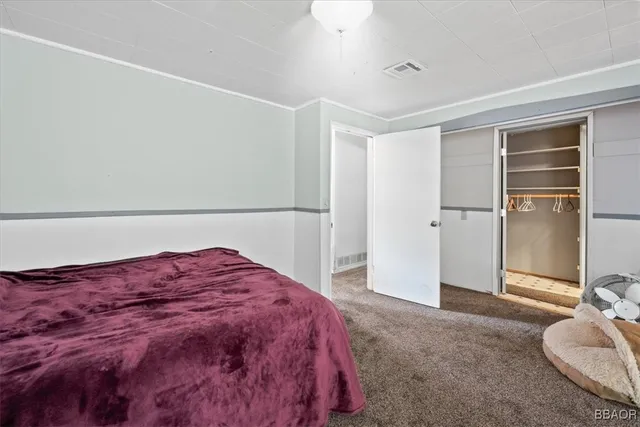 a bathroom with a toilet and a sink