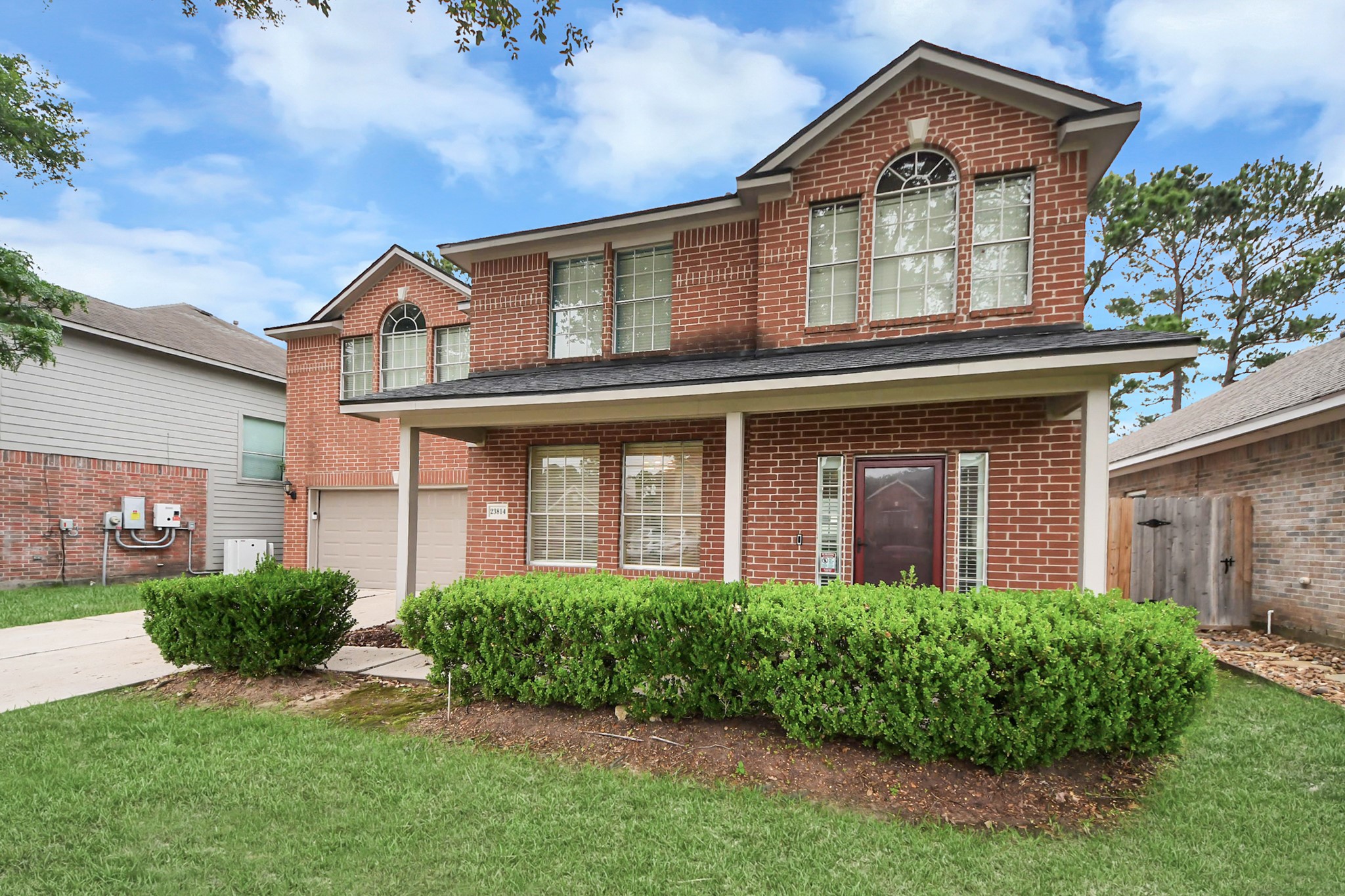 23814 Spring Dane Drive Spring, TX 77373 - Photo 4 of 41 a front view of a house with garden