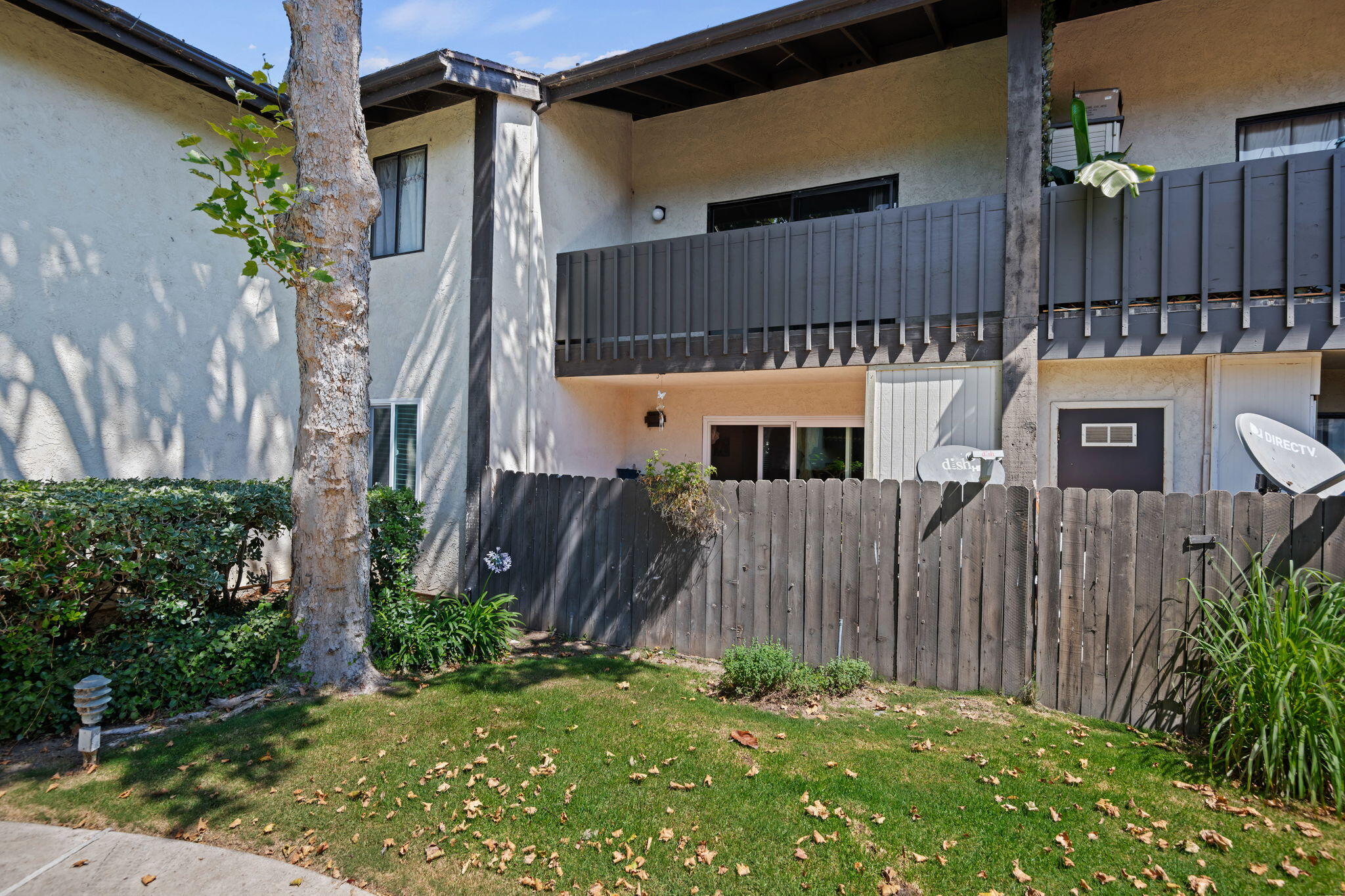 1676 Maple Avenue, Unit 4 Solvang, CA 93463 - Photo 14 of 16 a view of a house with a backyard