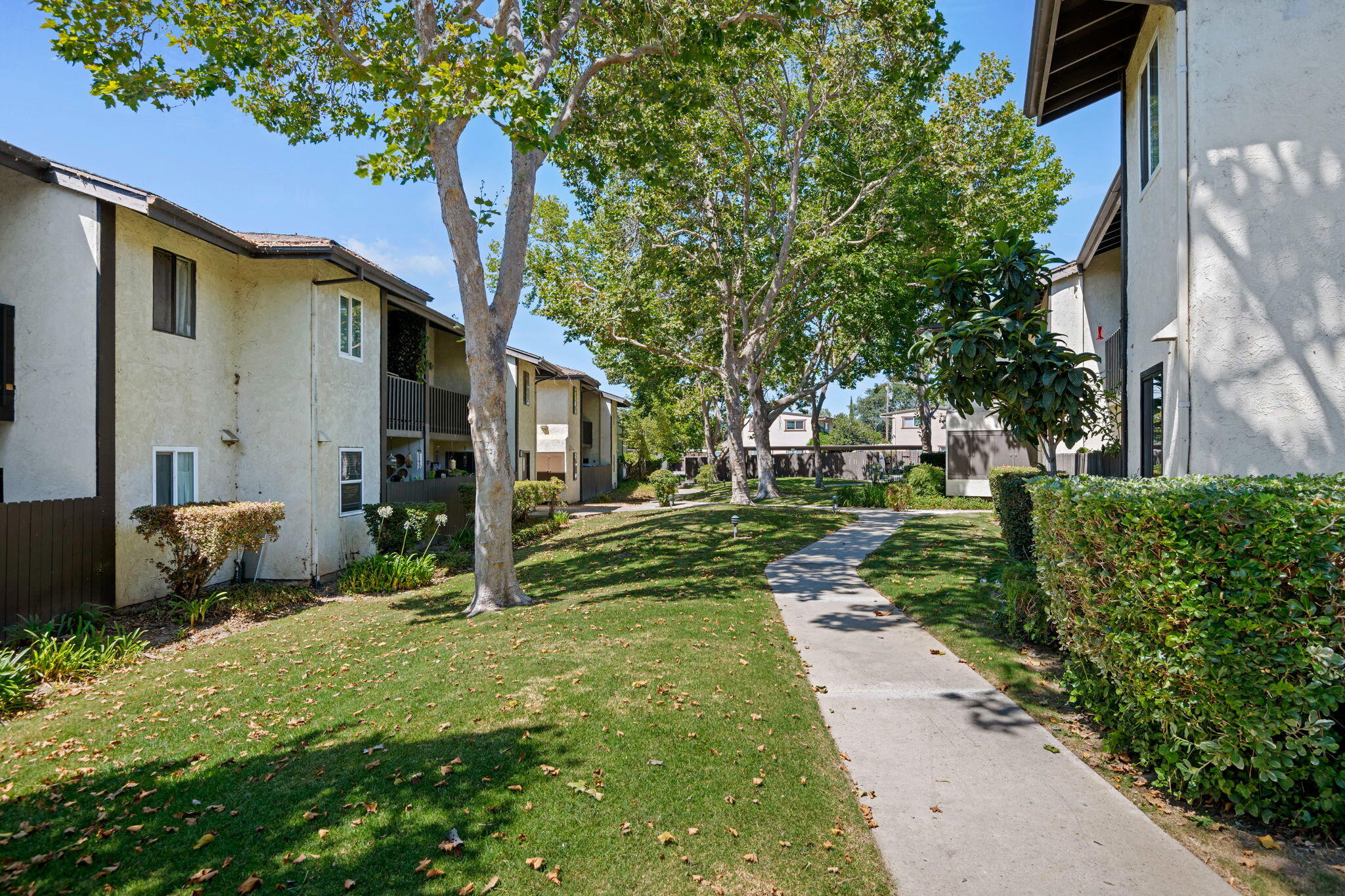 1676 Maple Avenue, Unit 4 Solvang, CA 93463 - Photo 15 of 16 a view of a house with a yard and pathway