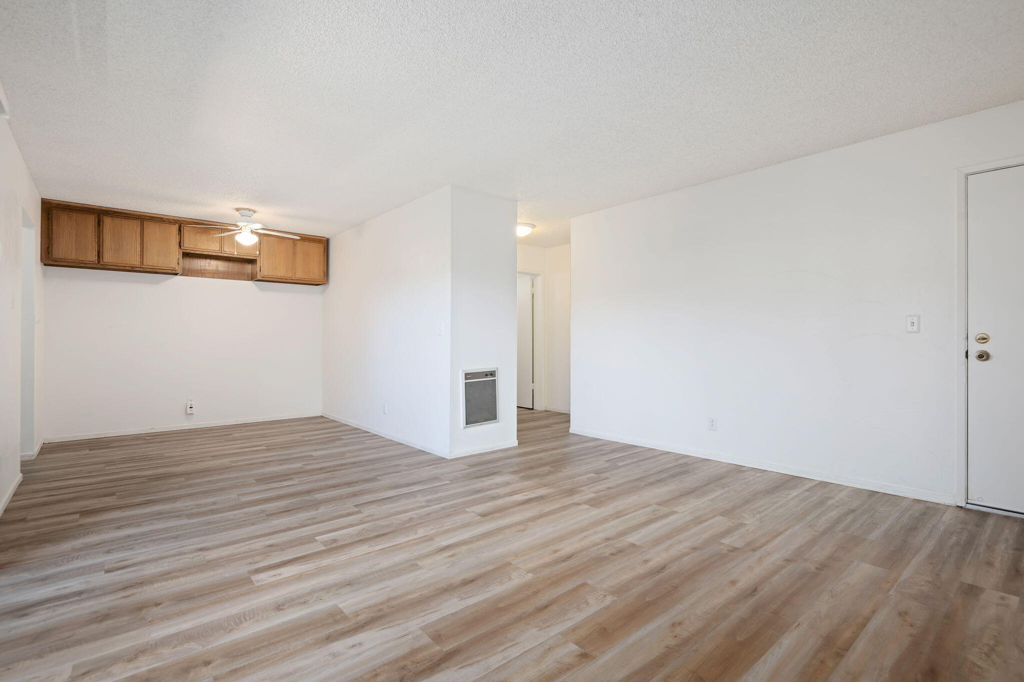 1676 Maple Avenue, Unit 4 Solvang, CA 93463 - Photo 6 of 16 a view of an empty room with wooden floor