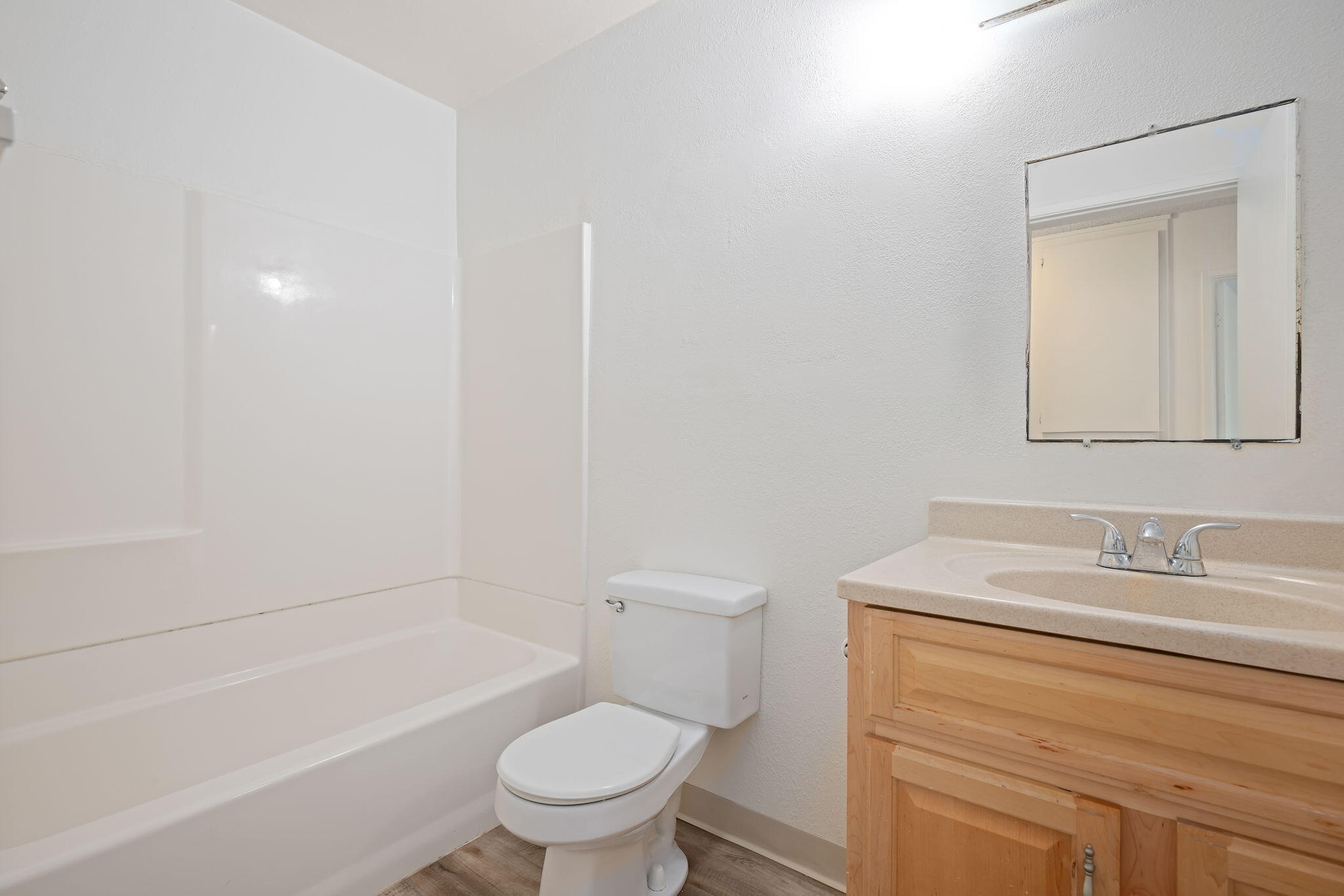 1676 Maple Avenue, Unit 4 Solvang, CA 93463 - Photo 8 of 16 a bathroom with a sink toilet and shower