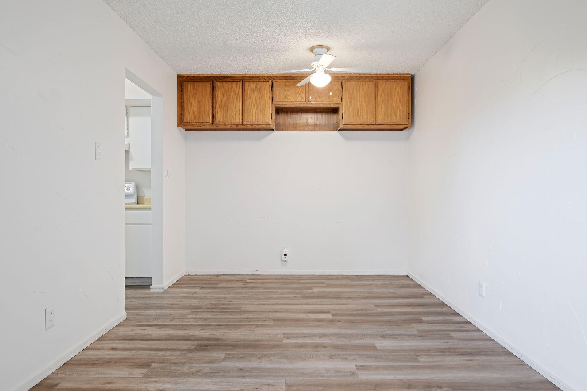 1676 Maple Avenue, Unit 4 Solvang, CA 93463 - Photo 10 of 16 a view of a room with wooden floor and small space
