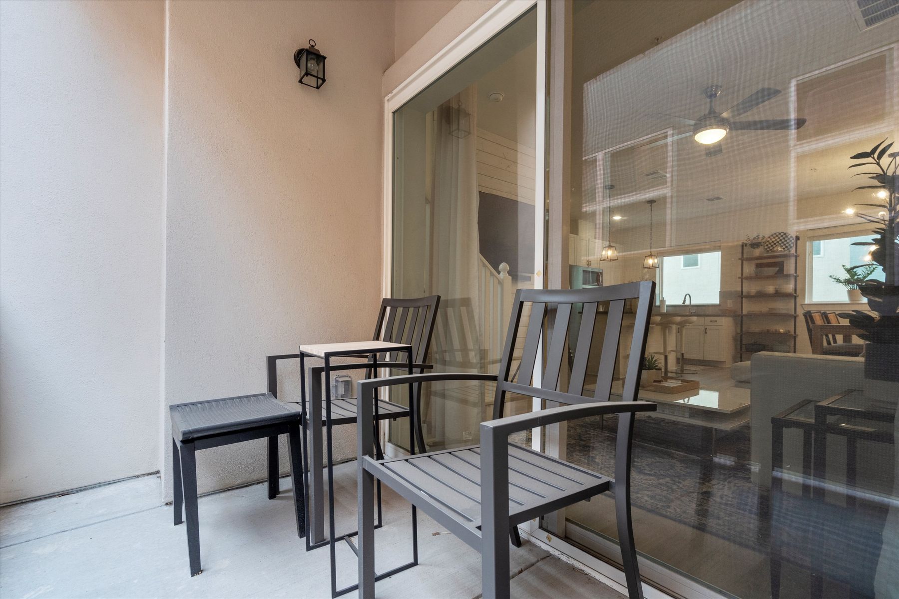 2827 Manor Road, Unit 3102 Austin, TX 78722 - Photo 14 of 18 An inviting private patio offers a serene space for outdoor relaxation and quiet moments.