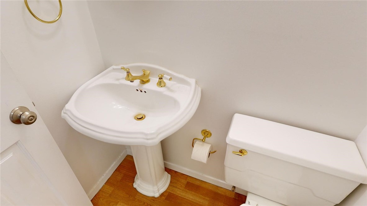 396 West Ash Avenue Decatur, IL 62526 - Photo 12 of 37 a bathroom with a sink and a mirror