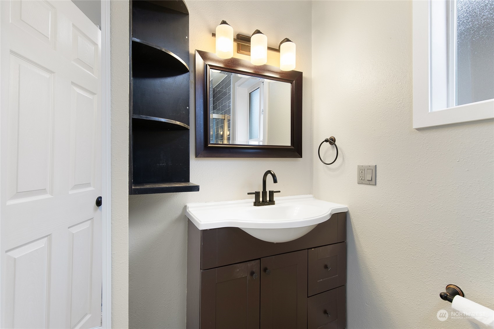 2934 Cedar Street Everett, WA 98201 - Photo 23 of 35 a bathroom with a sink vanity and a mirror
