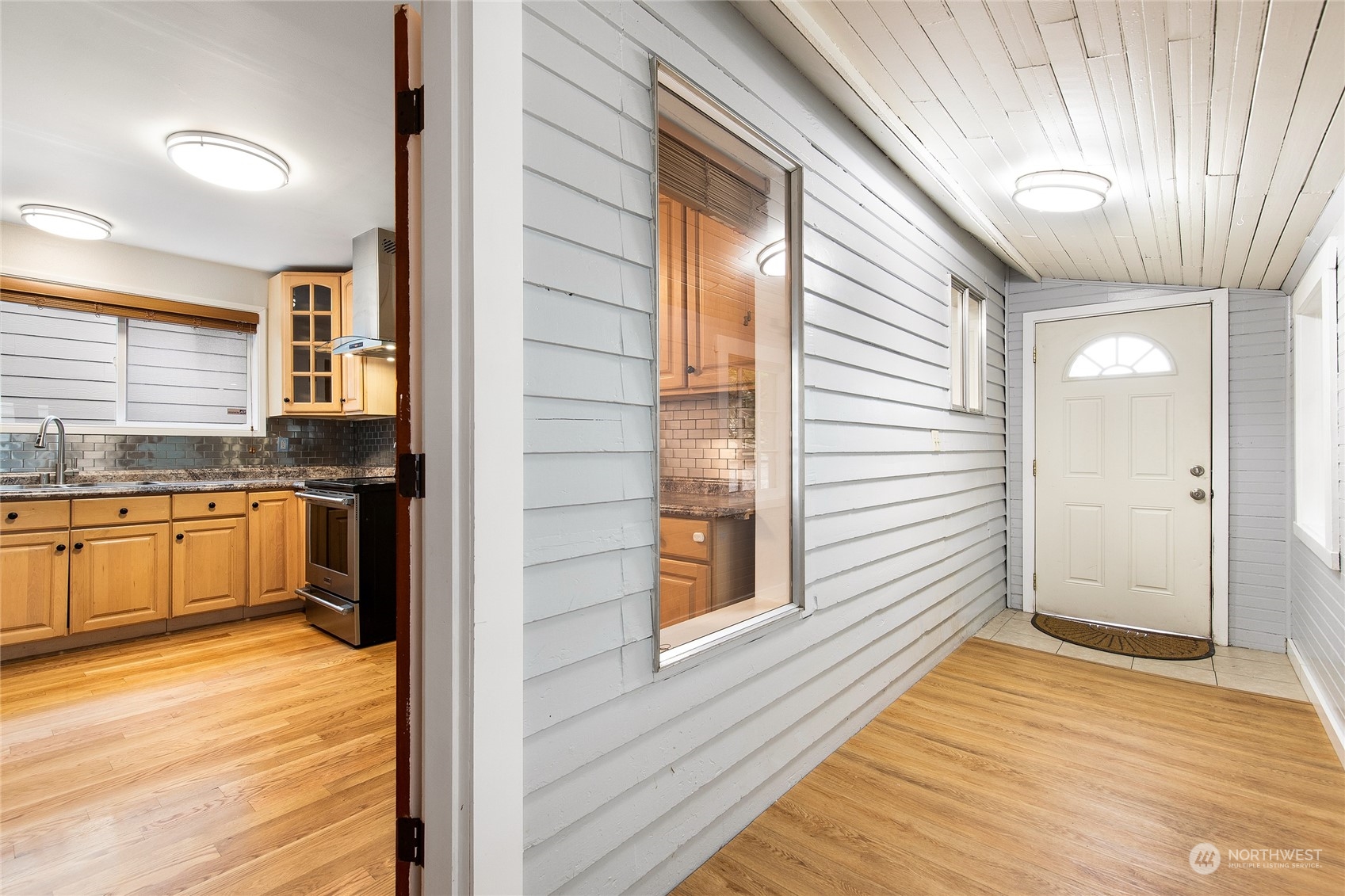 2934 Cedar Street Everett, WA 98201 - Photo 25 of 35 a view of a kitchen from a hallway