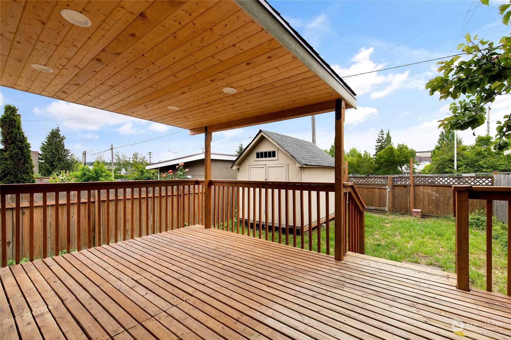 2934 Cedar Street Everett, WA 98201 - Photo 29 of 35 a view of balcony with wooden floor and fence